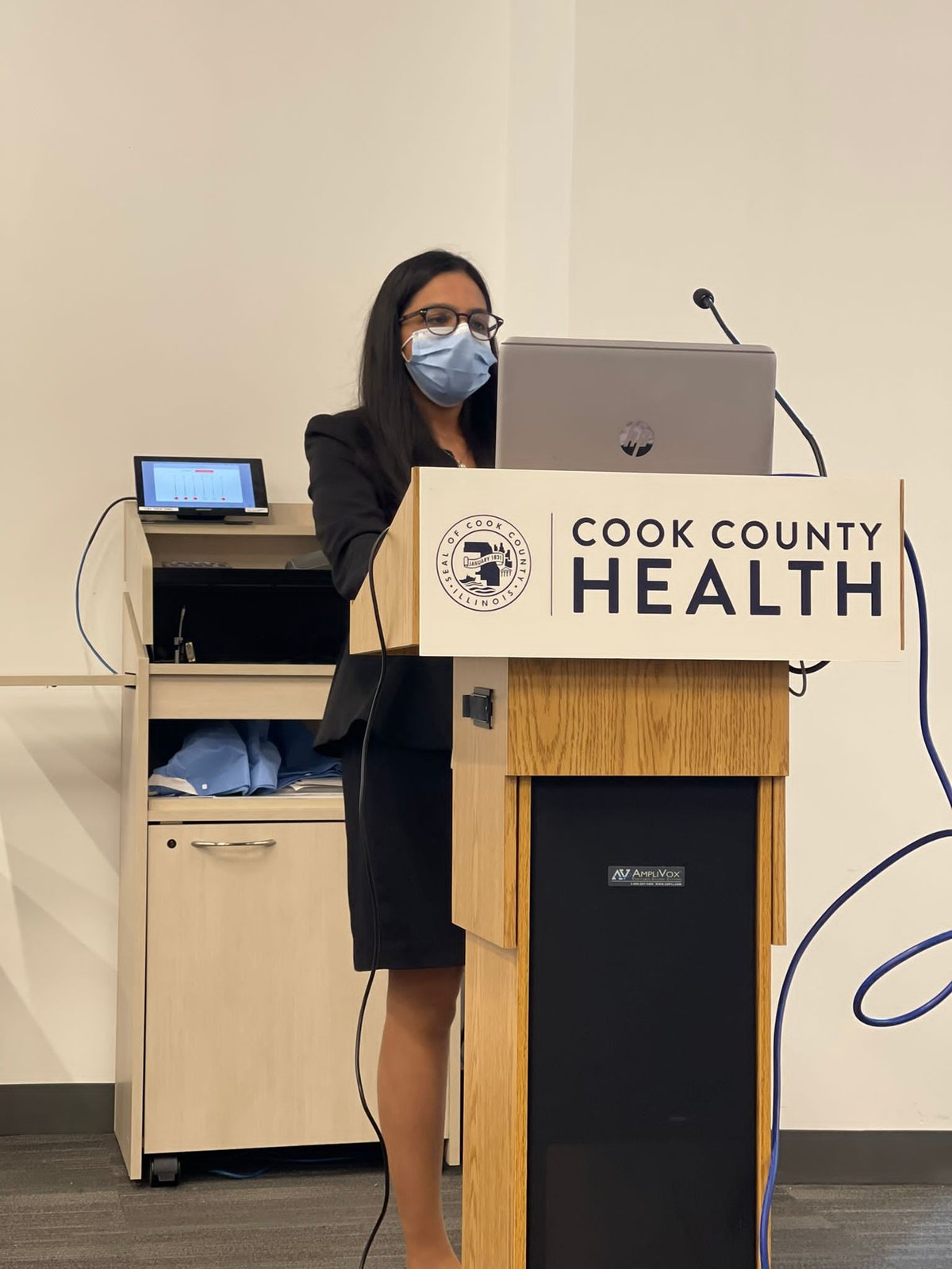 Dr. Patel presenting at Cook County Health